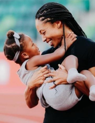 Marlean Felix daughter Allyson Felix and granddaughter.
